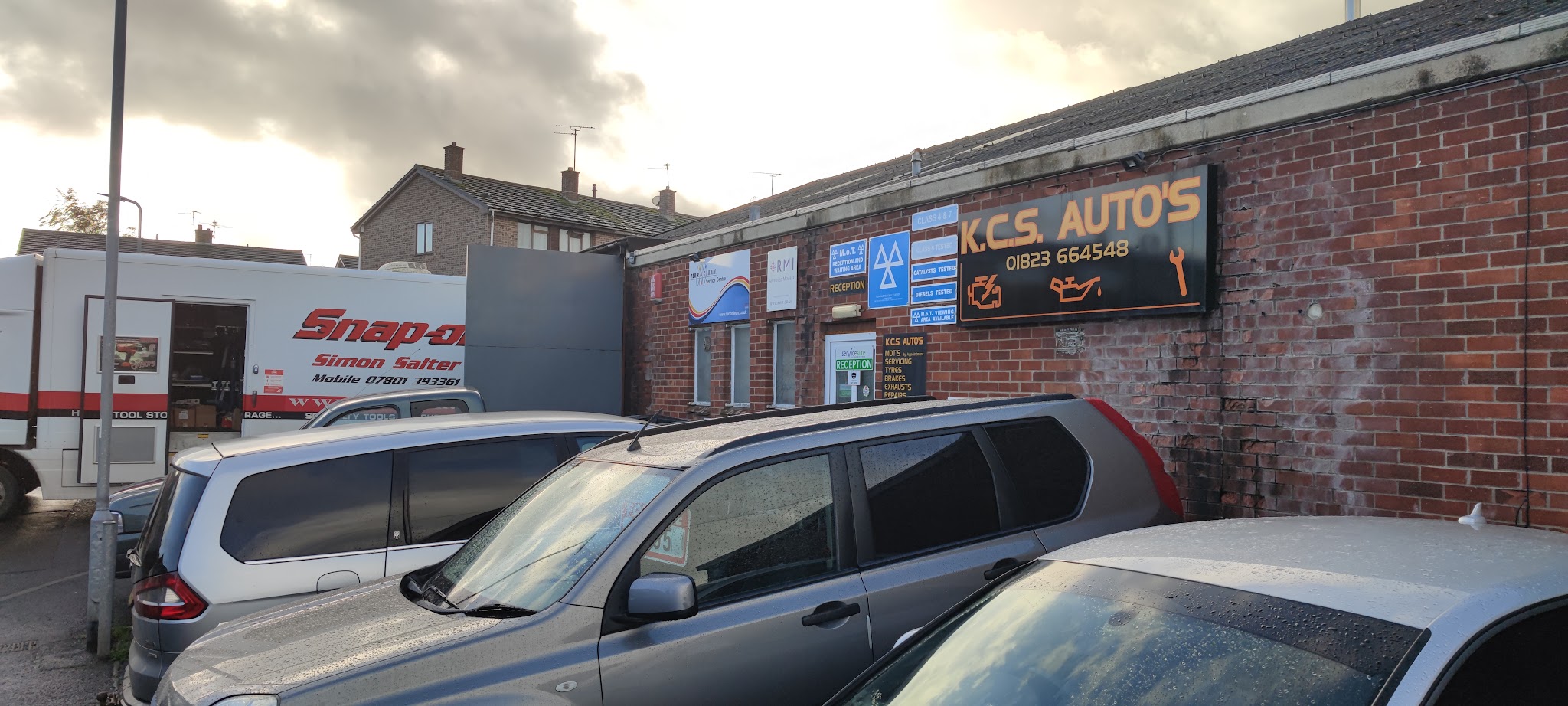 The K.C.S. Auto's workshop on the business park with cars parked outside