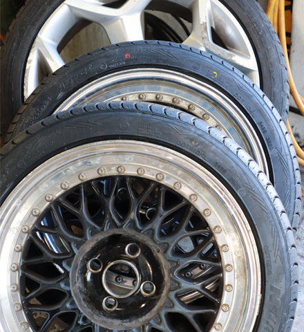 Alloy wheels stacked in the workshop