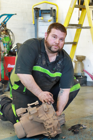 KCS mechanic working on a gearbox
