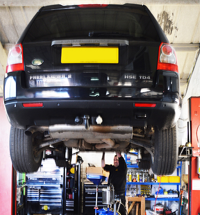 Land Rover raised on the lift